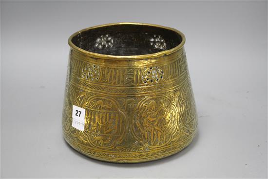 A Cairoware brass jardiniere, decorated with panels of figures and calligraphy, height 18cm, diameter 24cm